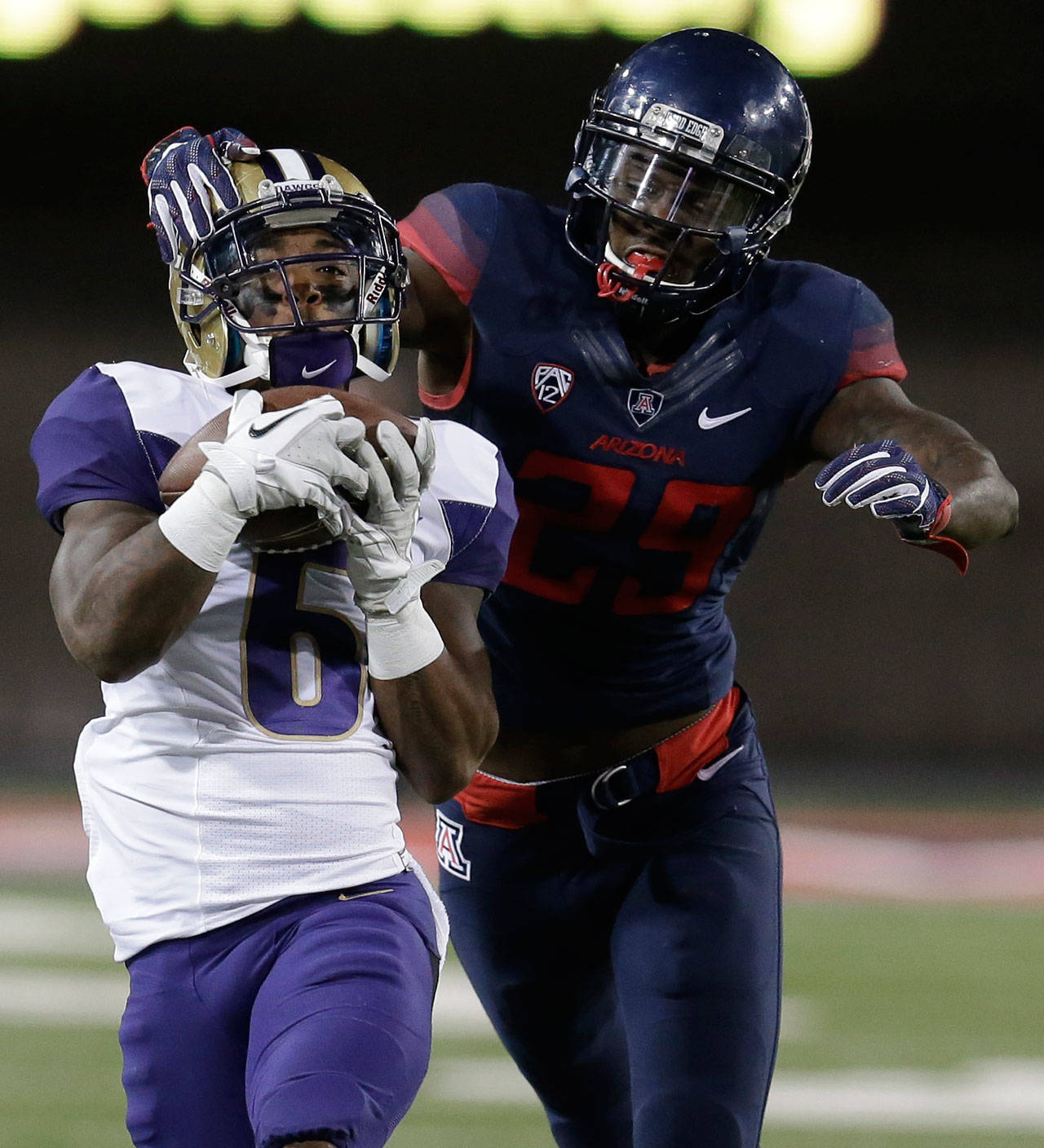 Washington wide receiver Chico McClatcher (6) catches a pass during the first half of a game against Arizona on Sept. 24, 2016, in Tucson, Ariz. (AP Photo/Rick Scuteri)