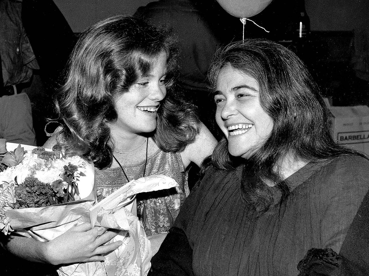 Feminist activist Kate Millett (right) during a surprise birthday party for her niece, Kristan Vigard, in New York in 1979. Millett was an activist, artist and educator whose best-selling “Sexual Politics” was a landmark of cultural criticism and a manifesto for the modern feminist movement. (AP Photo/Ron Frehm, File)
