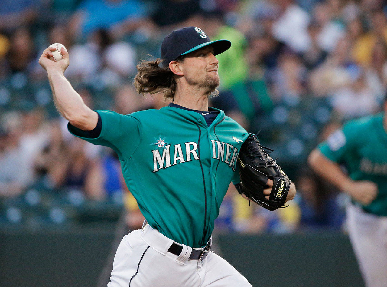 Mariners starting pitcher Mike Leake throws to the Athletics during the first inning of a game Sept. 1, 2017, in Seattle. (AP Photo/Ted S. Warren)