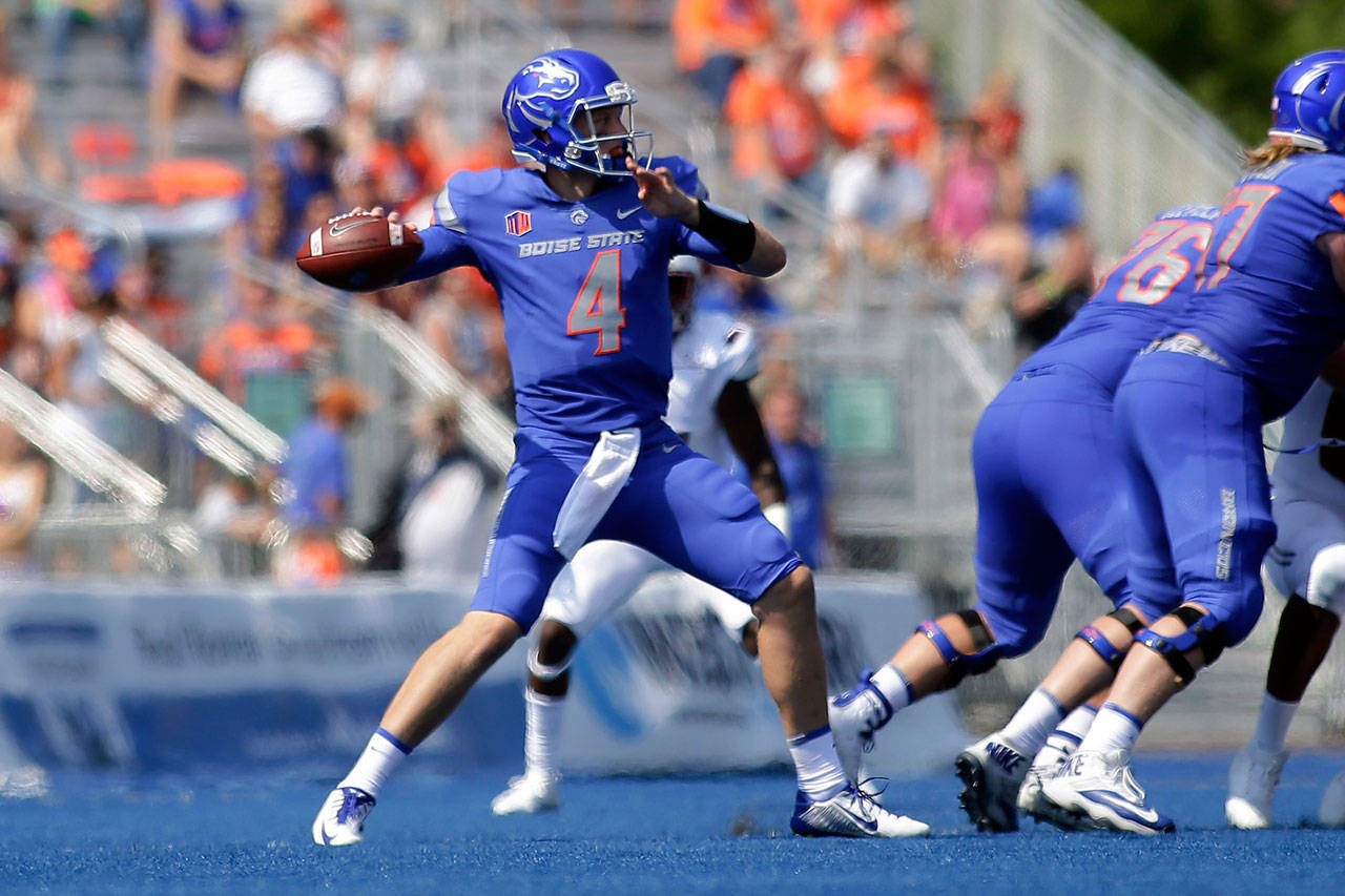 Boise State quarterback Brett Rypien (4) passes during the first half of a game against Troy on Sept. 2, 2017, in Boise, Idaho. (AP Photo/Otto Kitsinger)