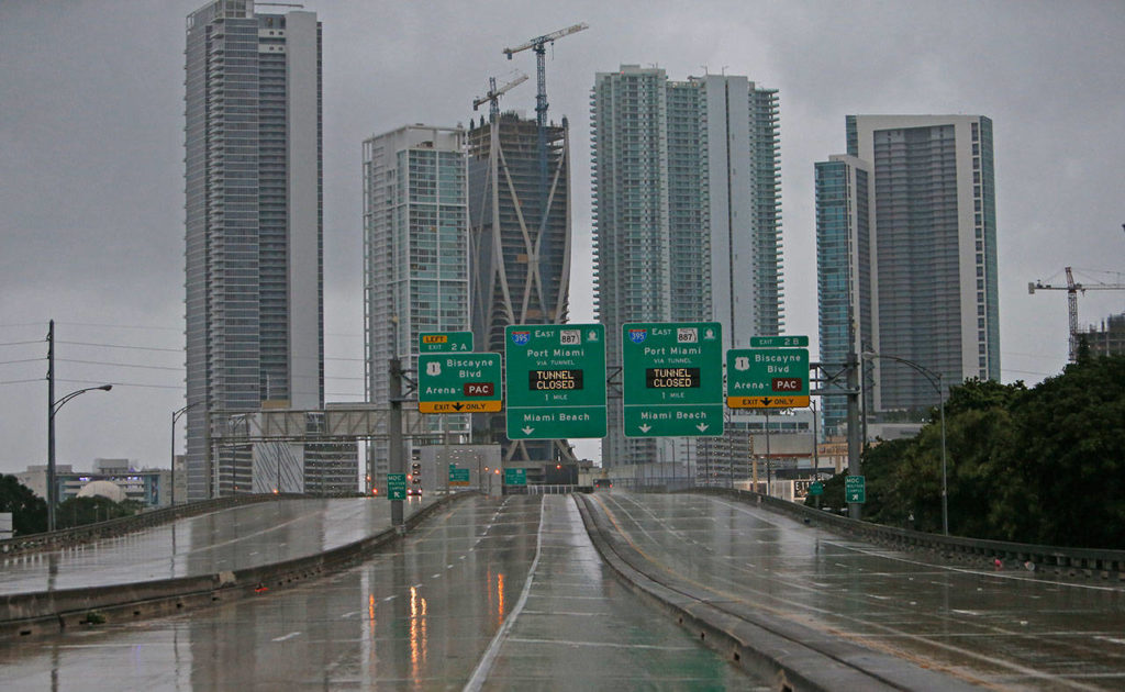 The Interstate remains empty as the outer bands of Hurricane Irma reached South Florida early Saturday, Sept. 9, 2017 in Miami. Gov. Rick Scott is urging anyone living in an evacuation zone in southwest Florida to leave by noon as the threat of Hurricane Irma has shifted west. (David Santiago/Miami Herald via AP)
