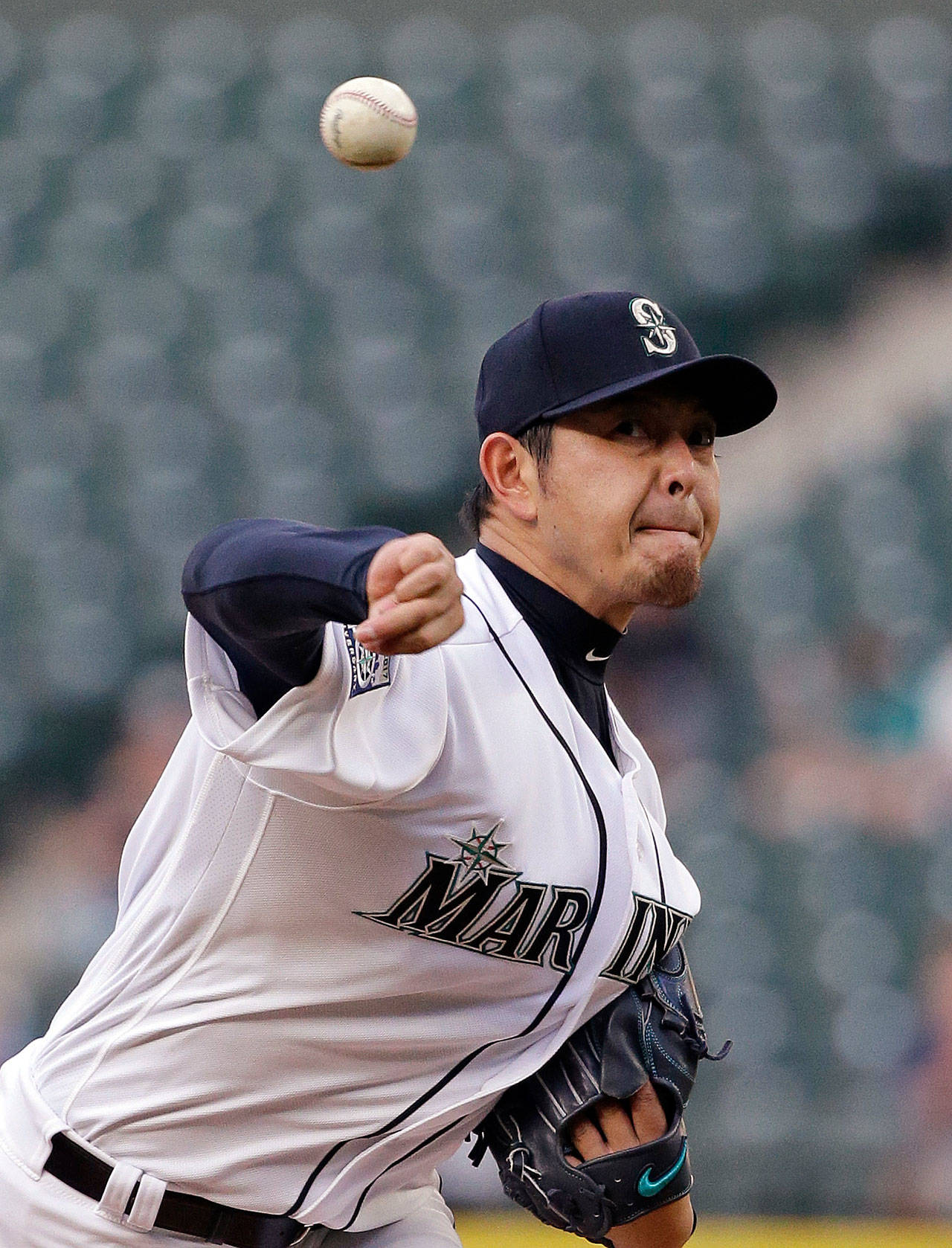 Seattle’s Hisashi Iwakuma throws against the Los Angeles Angels during the second inning of a May 3 game at Safeco Field. (AP Photo/Elaine Thompson)
