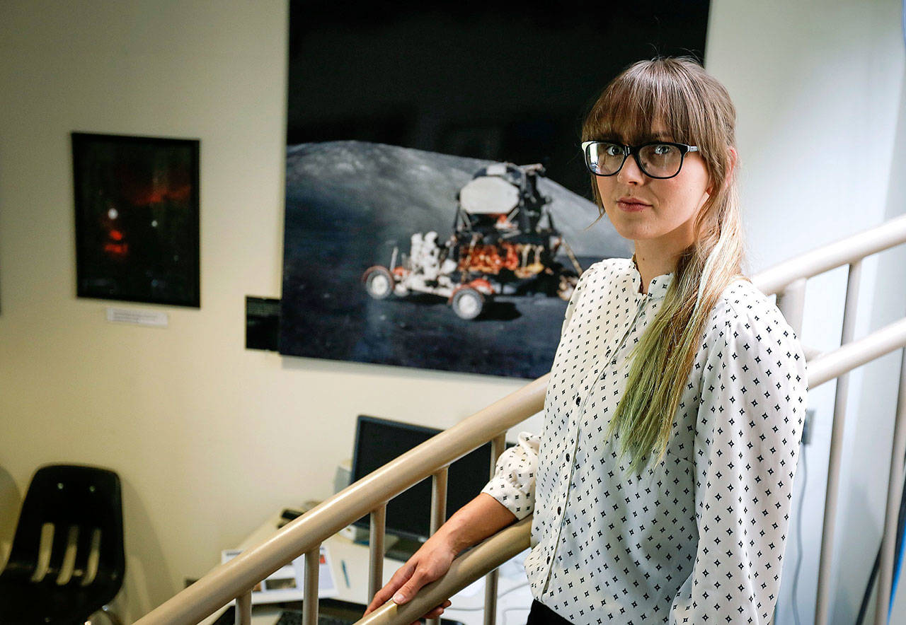 Stevie Holly-Knox, a Columbia Basin College student, poses inside of The Moore Observatory at Columbia Basin College in Pasco on Aug. 7. Holly-Knox will be transferring to University of Washington to finish her degree in astrophysics. She is one of 100 students nationwide who earned a trip to visit NASA. (Noelle Haro-Gomez/The Tri-City Herald via AP)