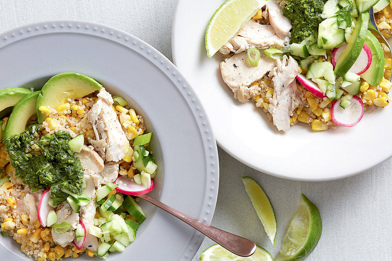 This one-bowl meal pairs quinoa with corn and is topped with grilled chicken, cucumber, radish and an herb sauce. (Photo by Stacy Zarin Goldberg for the Washington Post)