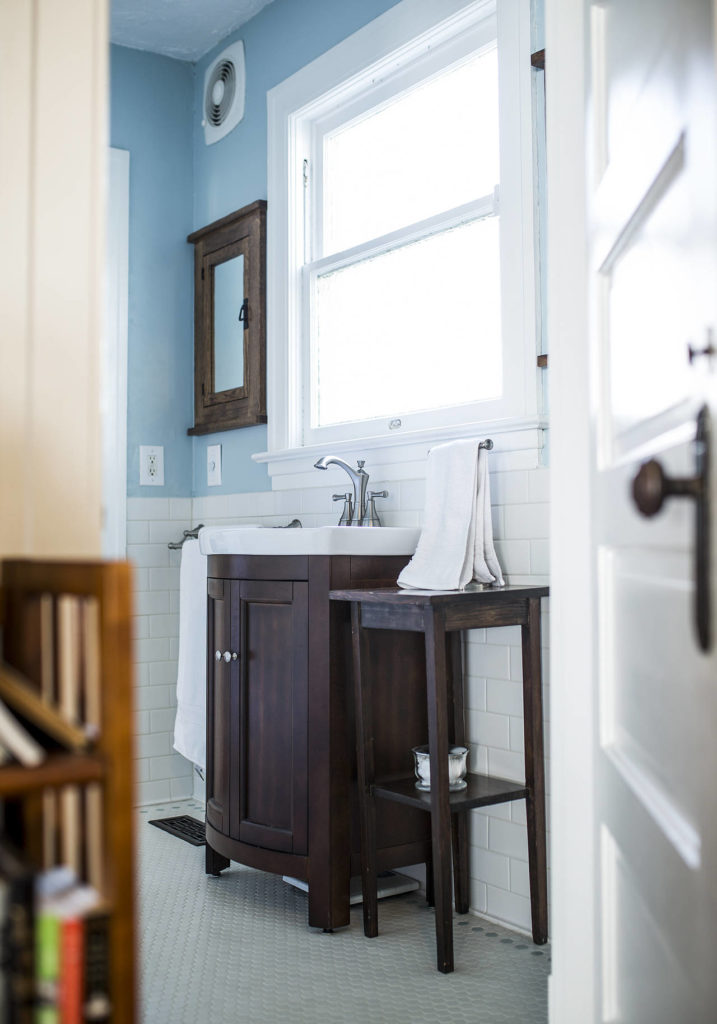 A remodeled first floor bathroom has Scandinavian blue and white tones. (Ian Terry / The Herald)
