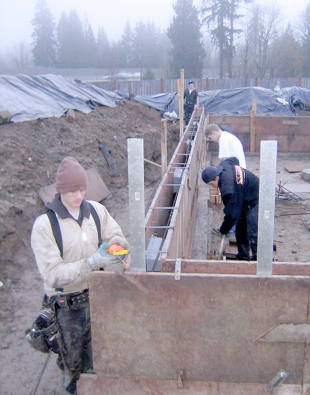 Students setting foundation forms on house No. 34 in 2008.