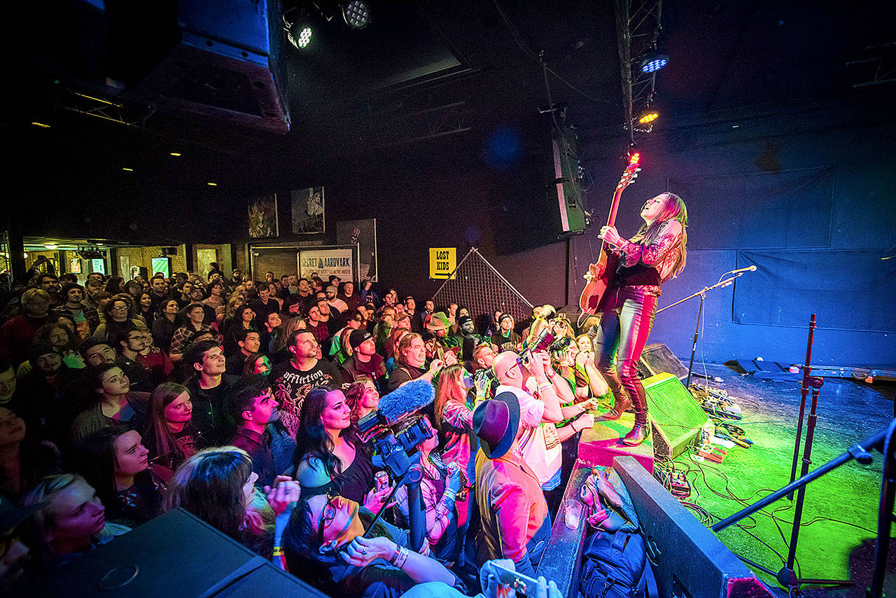 Thunderpussy guitarist Whitney Petty thrills the crowd at Tony V’s Garage during the Fisherman’s Village Music Festival in March. Thunderpussy plays the Everett Yacht Club on Saturday evening. Photo by Nate Watters