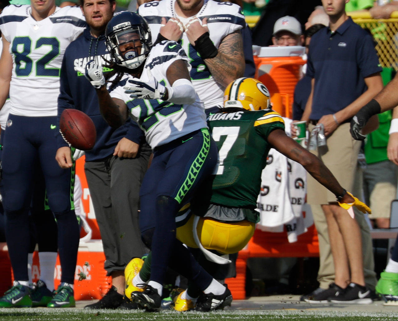 Seahawks cornerback Shaquill Griffin breaks up a pass intended for the Packers’ Davante Adams during the first half of a game Sept. 10, 2017, in Green Bay, Wis. (AP Photo/Morry Gash)