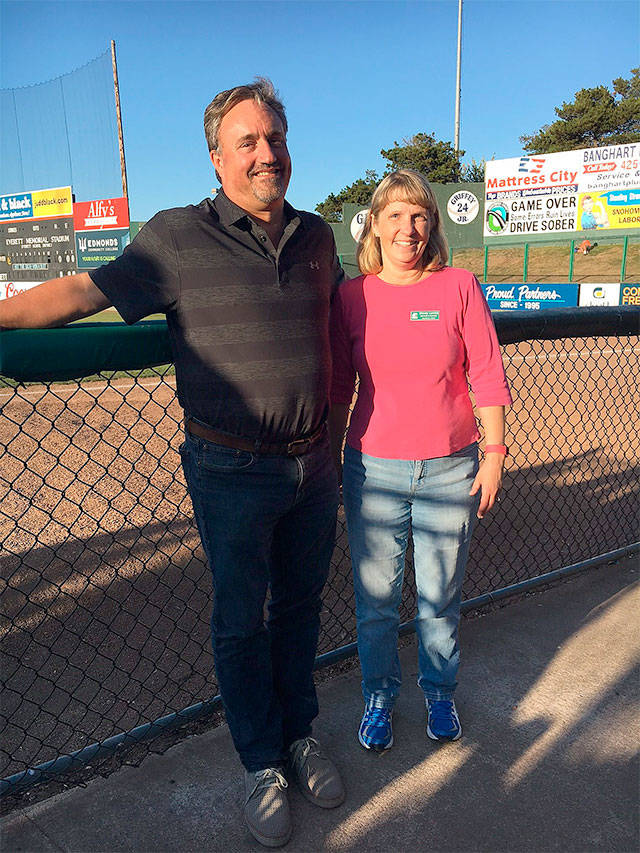 The nonprofit organization Housing Hope announced its volunteers of the year at a recent AquaSox game. They include Wendy Lervick and John Petosa. (Contributed photo)