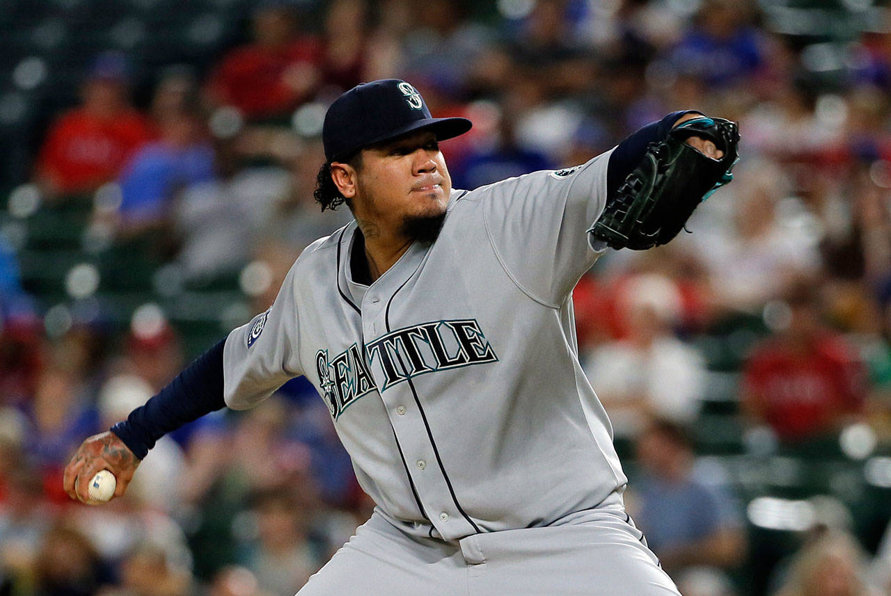 Mariners starting pitcher Felix Hernandez (34) throws to the Rangers in the fourth inning of a game Sept. 14, 2017, in Arlington, Texas. (AP Photo/Tony Gutierrez)