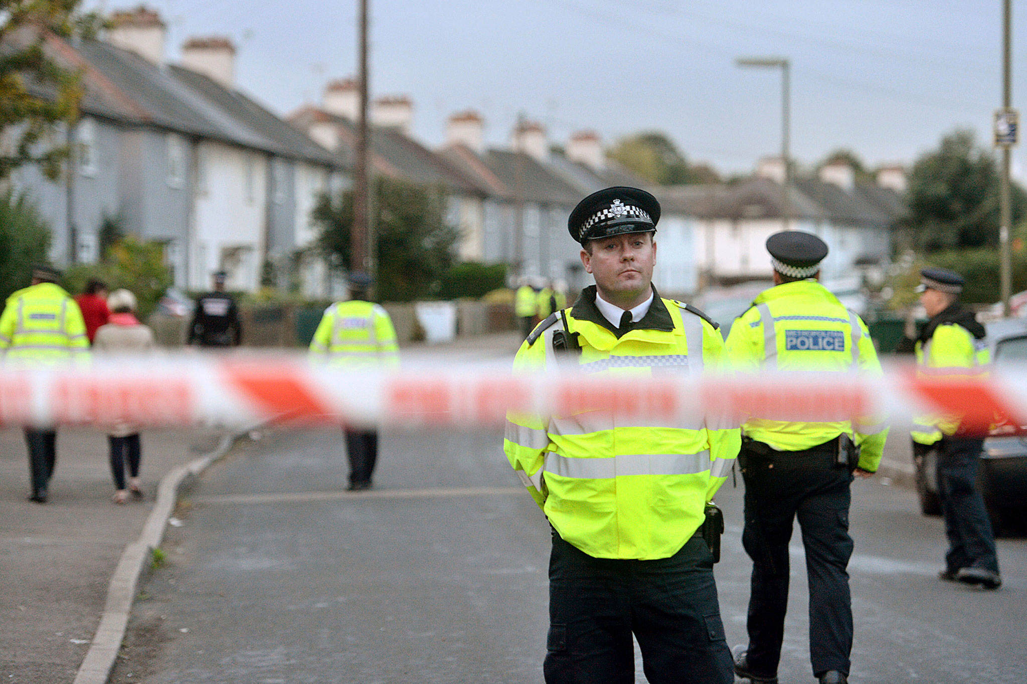 Police work Saturday near a property in Sunbury-on-Thames as part of the investigation into Friday’s Parsons Green bombing in London. (Victoria Jones/PA)