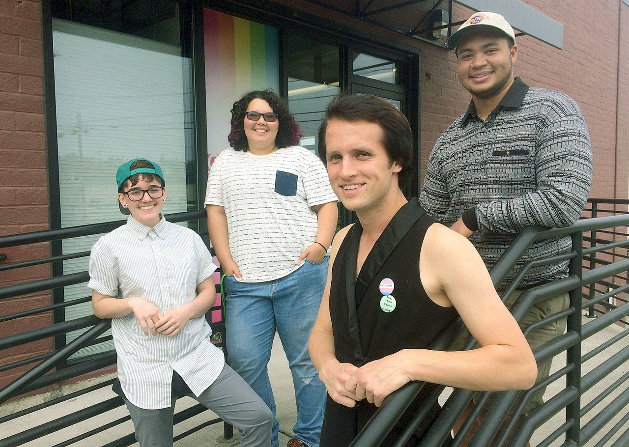 Louie Borgen (left), 19, Skylar Robinson, 16, Timmie Flock, 23, and Theo Calhoun, 20, pose outside the LGBT youth center in Tacoma on Sept. 9. Washington natives soon might be able to change the gender designation on their birth certificates to one that is neither male nor female. Call it gender X or the more clinical term: non-binary. The group, all members of Tacoma’s Oasis Youth Center, would welcome a non-binary gender option on Washington State birth certificates. (Craig Sailor /The News Tribune via AP)