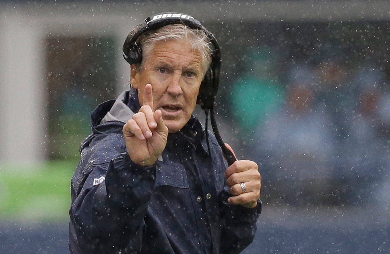 Seattle Seahawks head coach Pete Carroll gestures from the sideline during Sunday’s 12-9 win over the San Francisco 49ers. (AP Photo/Elaine Thompson)