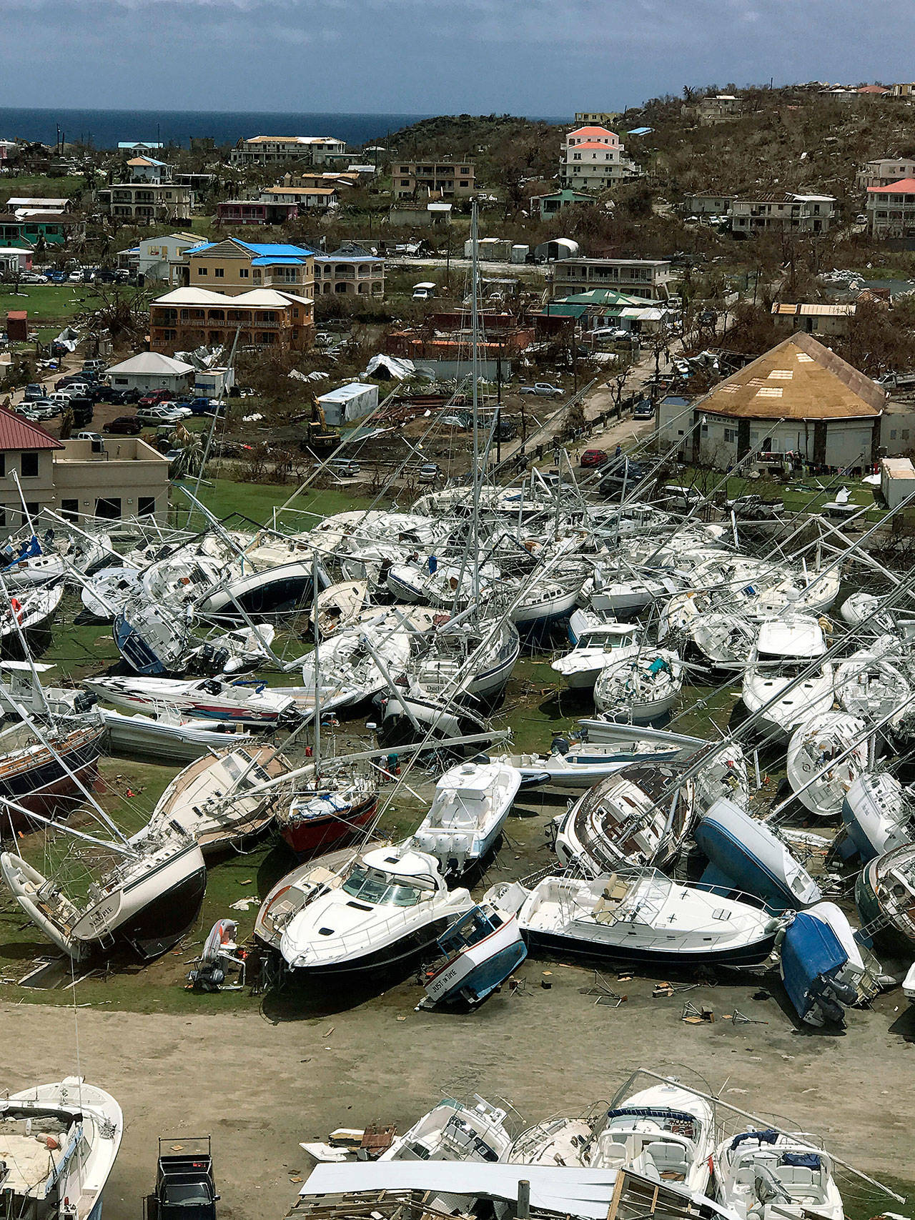 This photo taken Thursday shows damaged boats at the Virgin Gorda Yacht Harbour in the aftermath of Hurricane Irma on Virgin Gorda, in the British Virgin Islands. (Guillermo Houwer via AP)