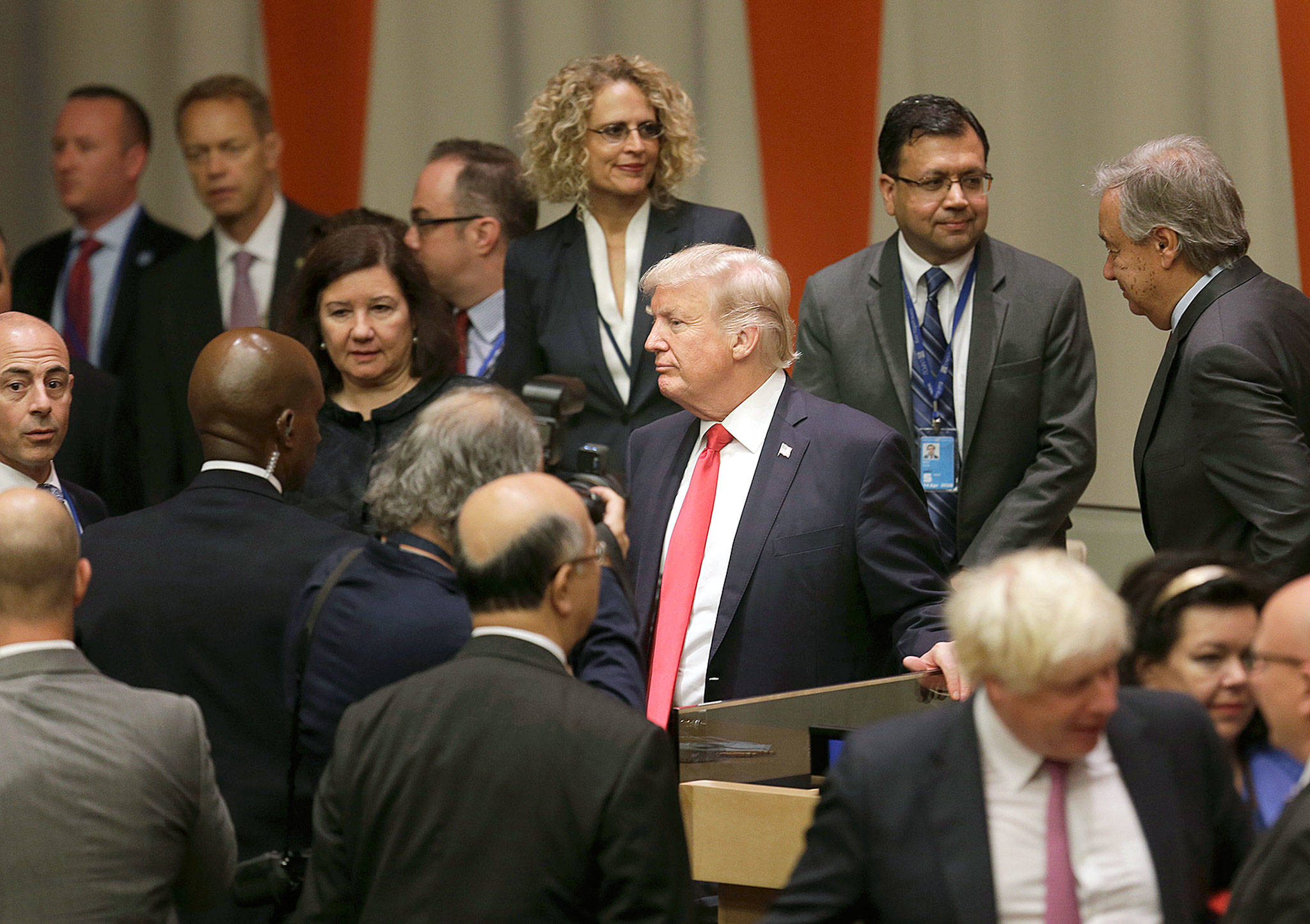 U.S. President Donald Trump (center) makes his way through diplomats and others after a meeting during the United Nations General Assembly at U.N. headquarters on Monday in New York. (AP Photo/Seth Wenig)