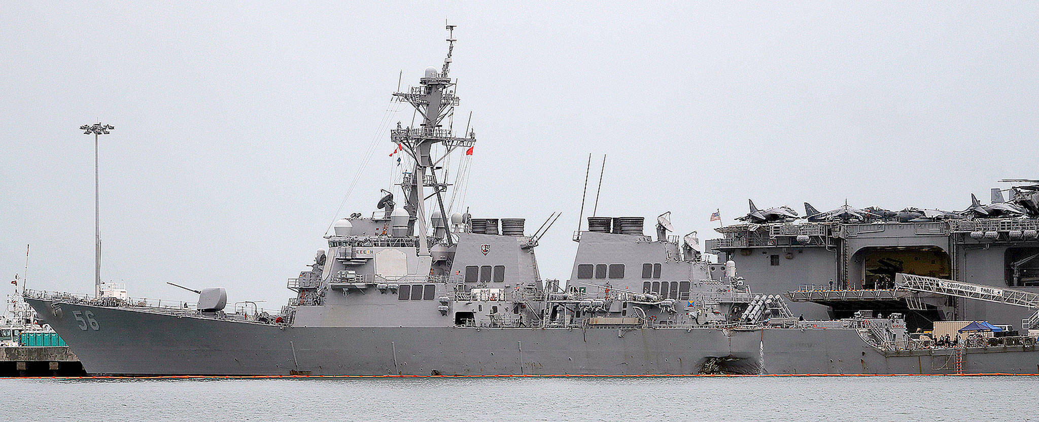 The damaged port aft hull of the USS John S. McCain at Singapore’s Changi naval base on Aug. 22. (AP Photo/Wong Maye-E)