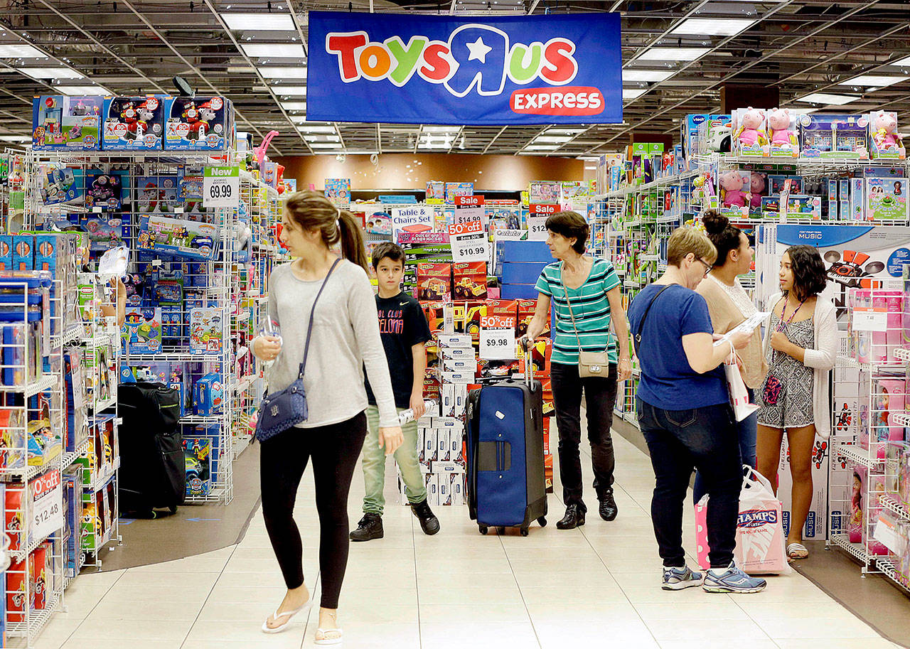 A Toys R Us store on Black Friday in Miami last year. The pioneering big box toy retailer announced late Monday it has filed for Chapter 11 bankruptcy protection while continuing with normal business operations. (AP Photo/Alan Diaz, File)