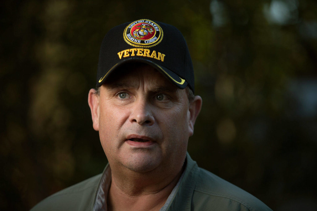 “I remember thinking I was sharing his last few moments with him,” says Byron Petit, a retired Marine with years of combat medical training, at his home on Tuesday in Marysville. Petit found badly injured Christian Schimandle down off a 50-foot cliff northwest of Darrington, carried him up the cliff, and stay with him while awaiting medical help. (Andy Bronson / The Herald)
