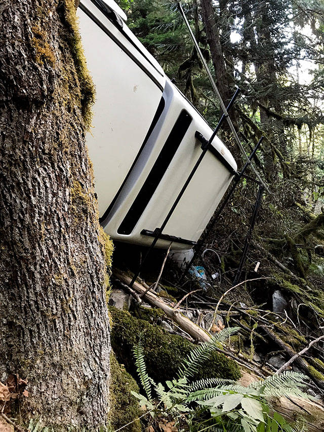 A Toyota Tundra driven by Christian Schimandle, 43, a cell tower worker, crashed and rolled over a cliff and into a maple tree Sept. 13, in remote woods northwest of Darrington. A stump pierced the driver’s side window and punctured Schimandle’s chest. He survived but spent weeks at Harborview Medical Center in Seattle. (Photo courtesy Schimandle family)