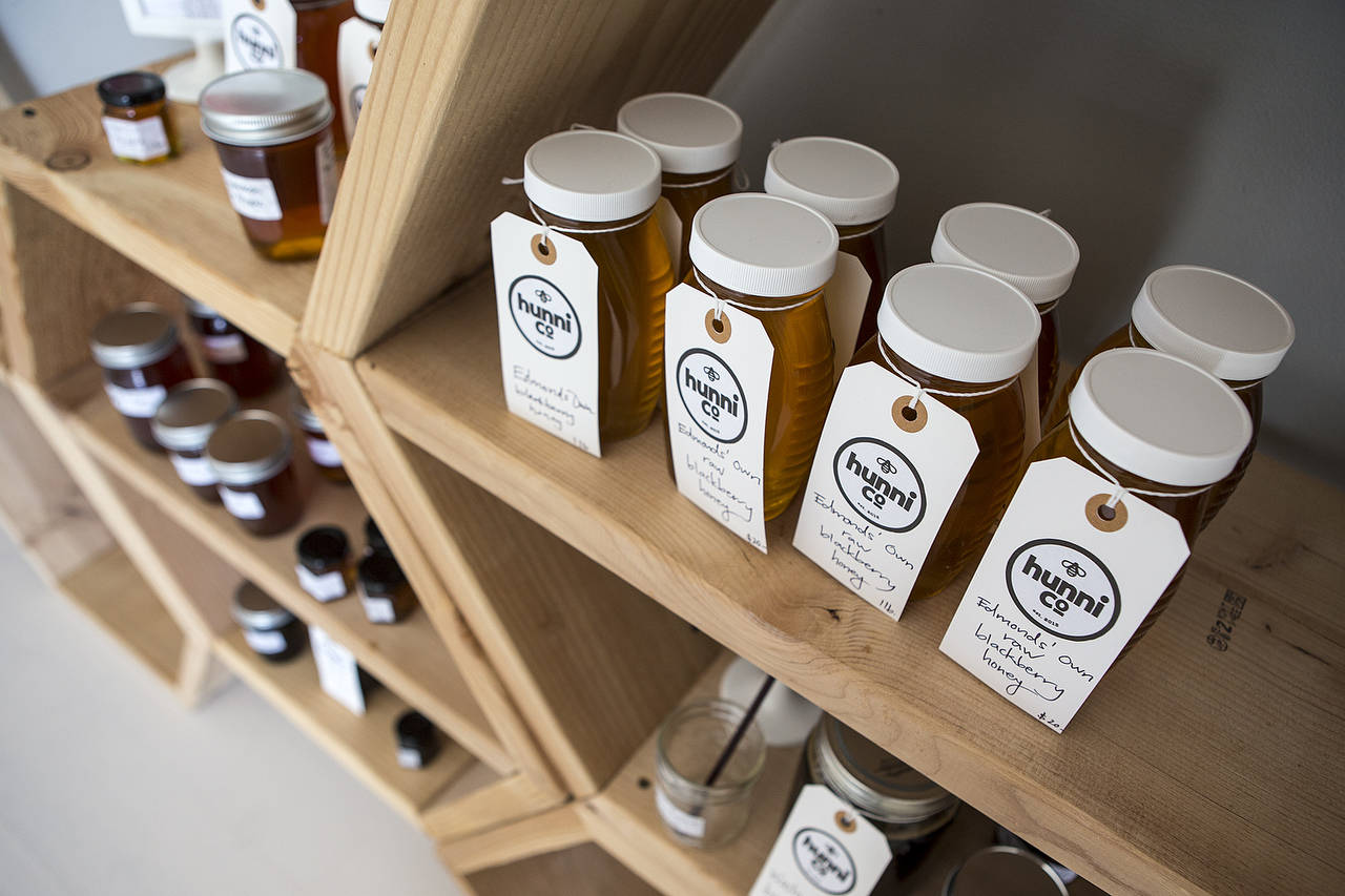 Local honey is seen for sale at Hunni Company in Edmonds. (Ian Terry / The Herald)
