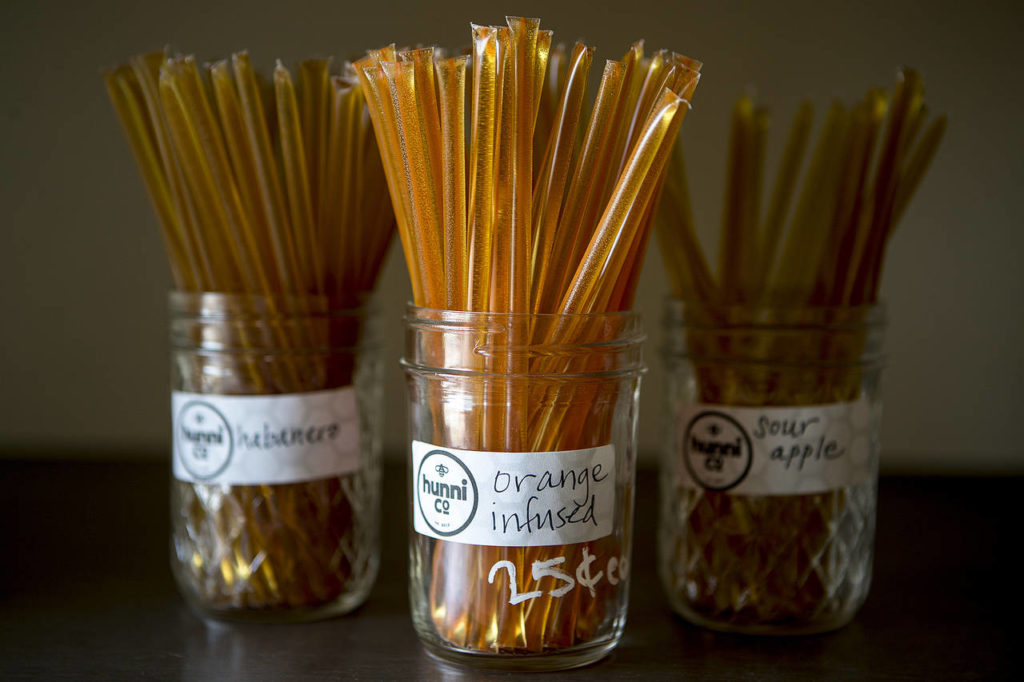 Flavored honey treats are seen for sale at Hunni Company in Edmonds. (Ian Terry / The Herald)
