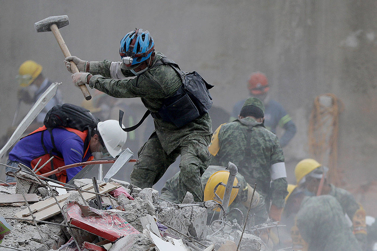 Relatives keep vigil amid search for Mexico quake survivors