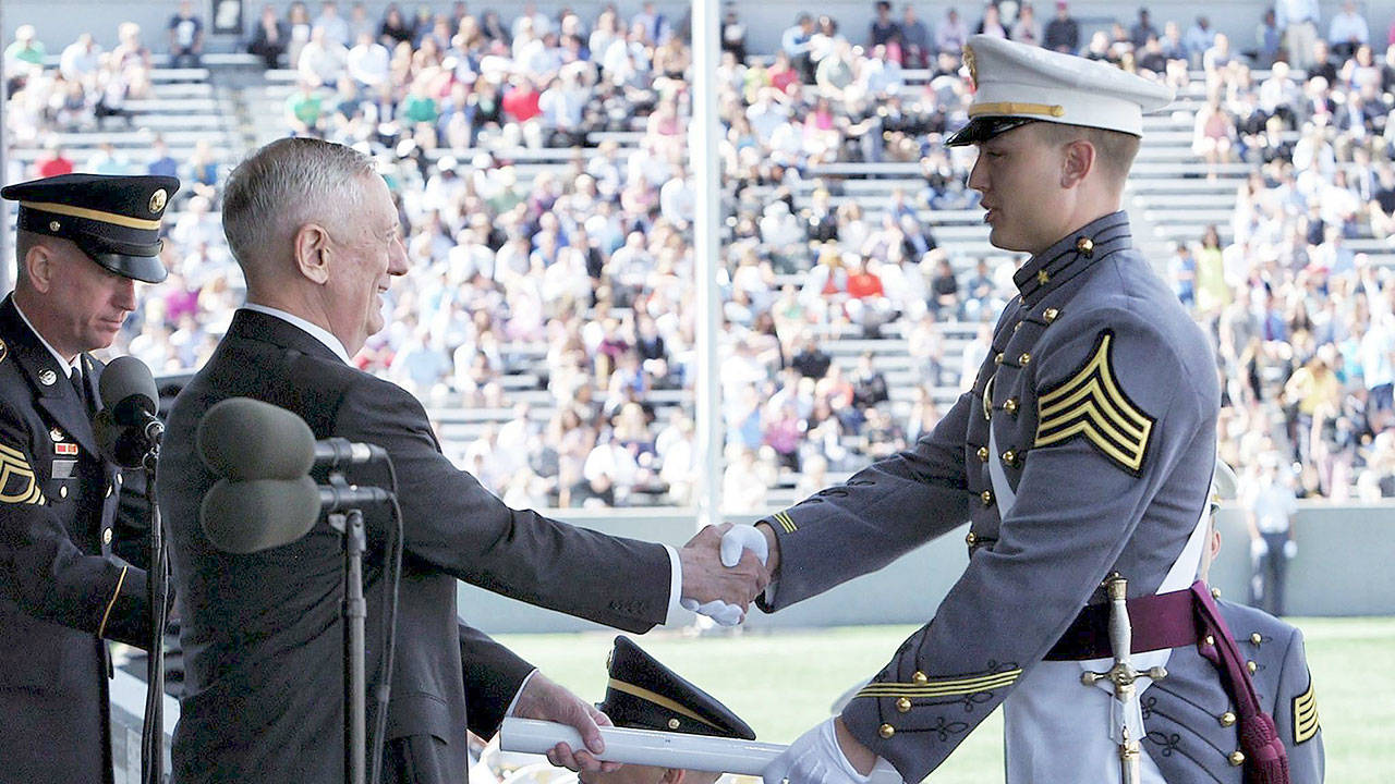 2nd Lt. Quinn Carlson shakes the hand of Defense Secretary James Mattis at the U.S. Military Academy graduation ceremony on May 27, 2017. (Contributed photo)
