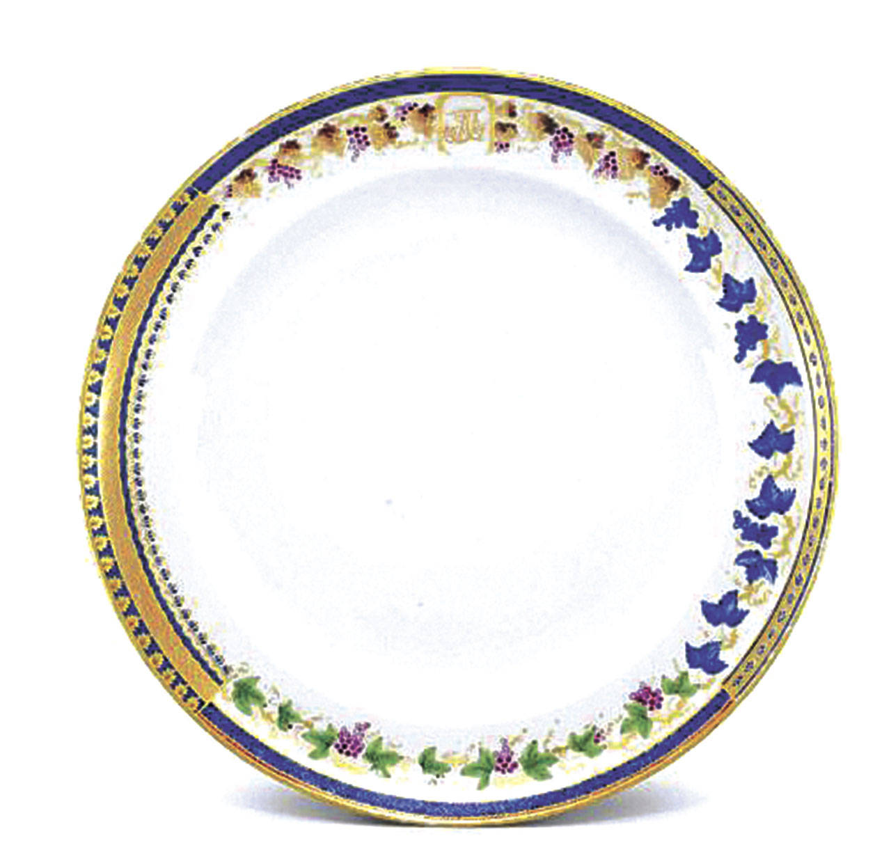 Sample design plates are very rare. They were made for store displays. A circa 1795 Chinese export plate showing four sample borders, one with a monogram, auctioned for over $8,000 this year in New York. (Cowles Syndicate Inc.)