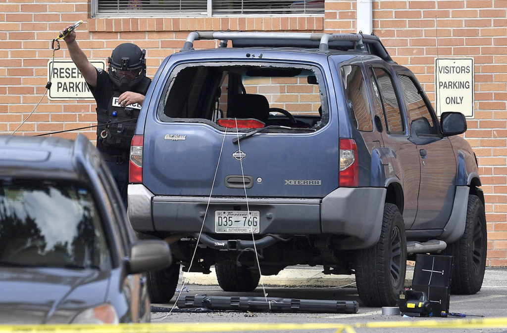 Police investigate the scene outside the Burnette Chapel Church of Christ after a deadly shooting at the church on Sunday in Antioch, Tennessee. (Andrew Nelles/The Tennessean via AP)
