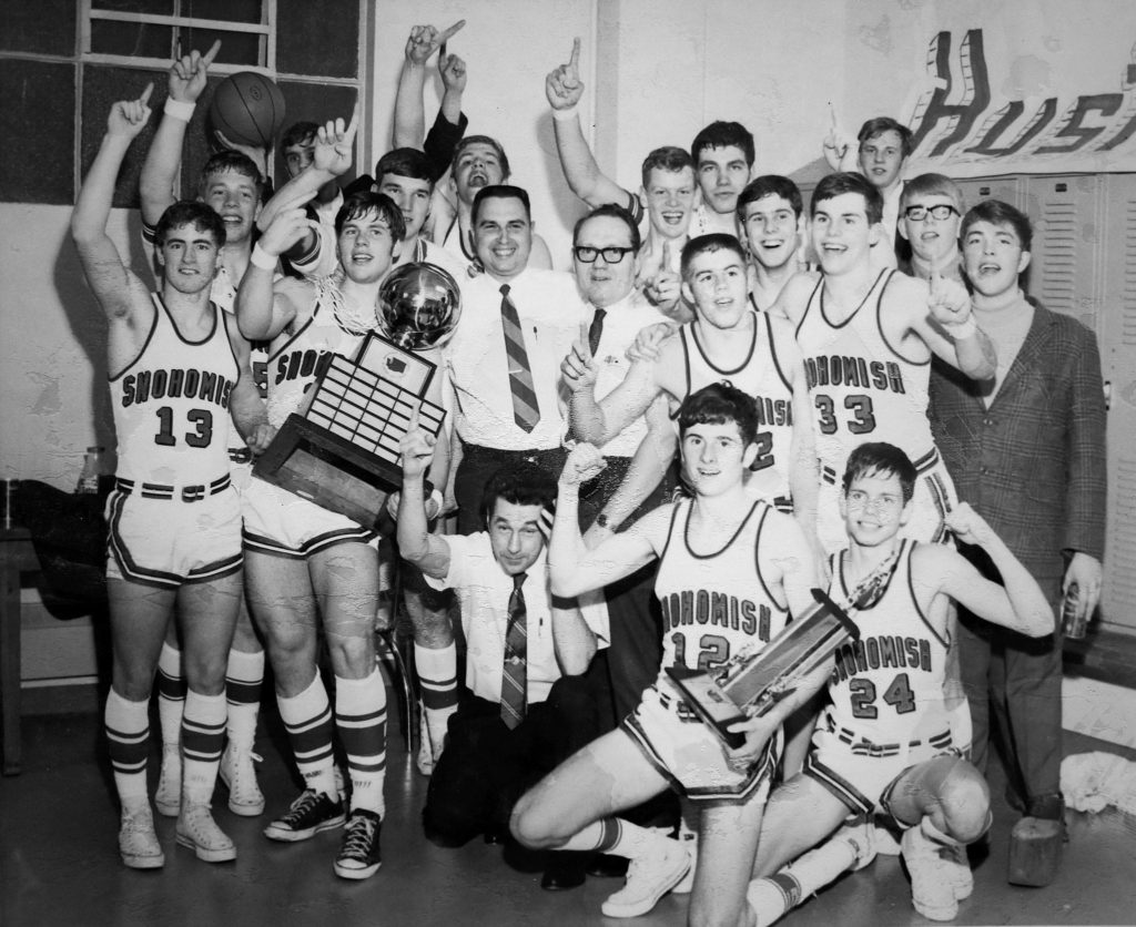 The 1970 Snohomish High School boys basketball team celebrates its 53-51 overtime victory over Pasco in the AAA state championship game in Seattle. The team will be inducted into the Snohomish County Sports Hall of Fame at Wednesday’s banquet. (Herald File Photo)
