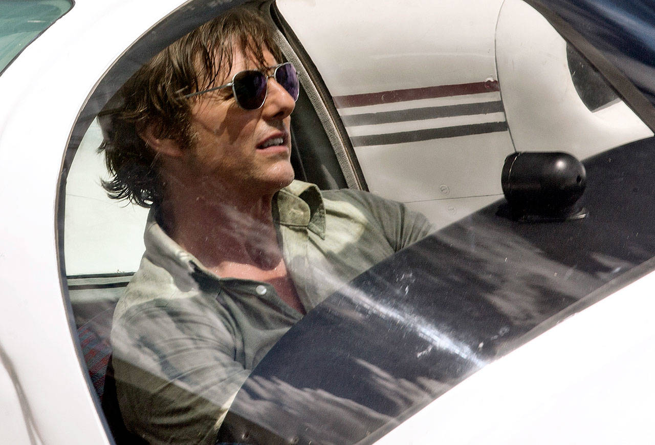 Tom Cruise plays a cocky airline pilot who gets into all kinds of hot water in “American Made.” (Universal Pictures)