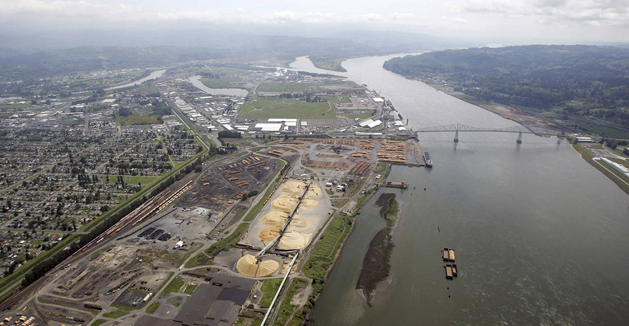 This 2005 photo shows the port of Longview on the Columbia River at Longview, Washington. (AP Photo/Elaine Thompson, File)