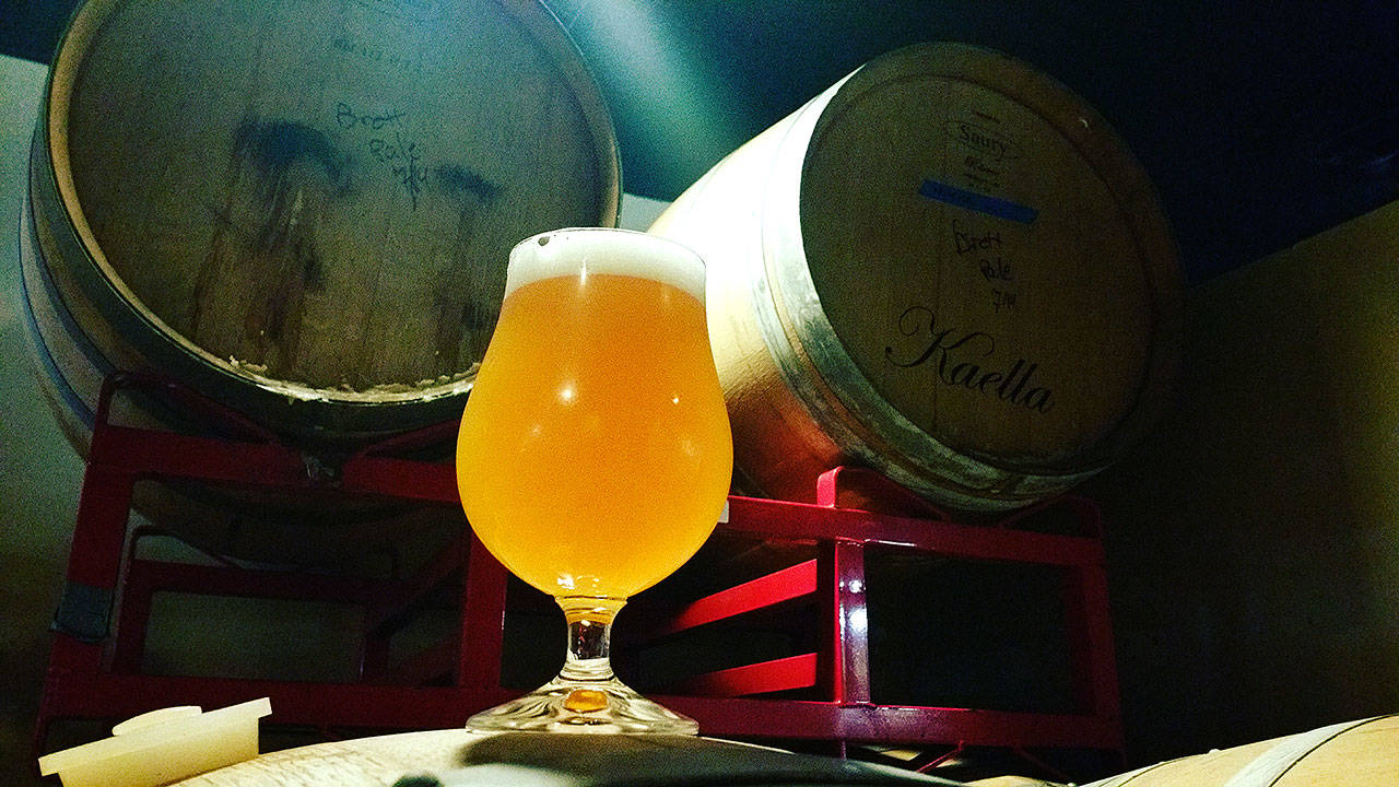 Crucible Brewing’s Magnetite, a barrel-aged apricot sour, is one of six barrel-aged beers the brewery will pour at Saturday’s second anniversary party. (Aaron Swaney/For The Herald)