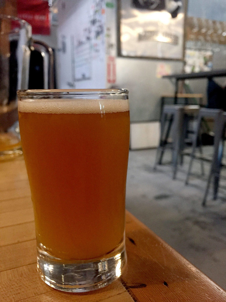 Crucible Brewing’s Brett’er Than Gold, a barrel-aged pumpkin golden ale, is one of six barrel-aged beers the brewery will be pouring at Saturday’s second anniversary party. (Aaron Swaney/For The Herald)
