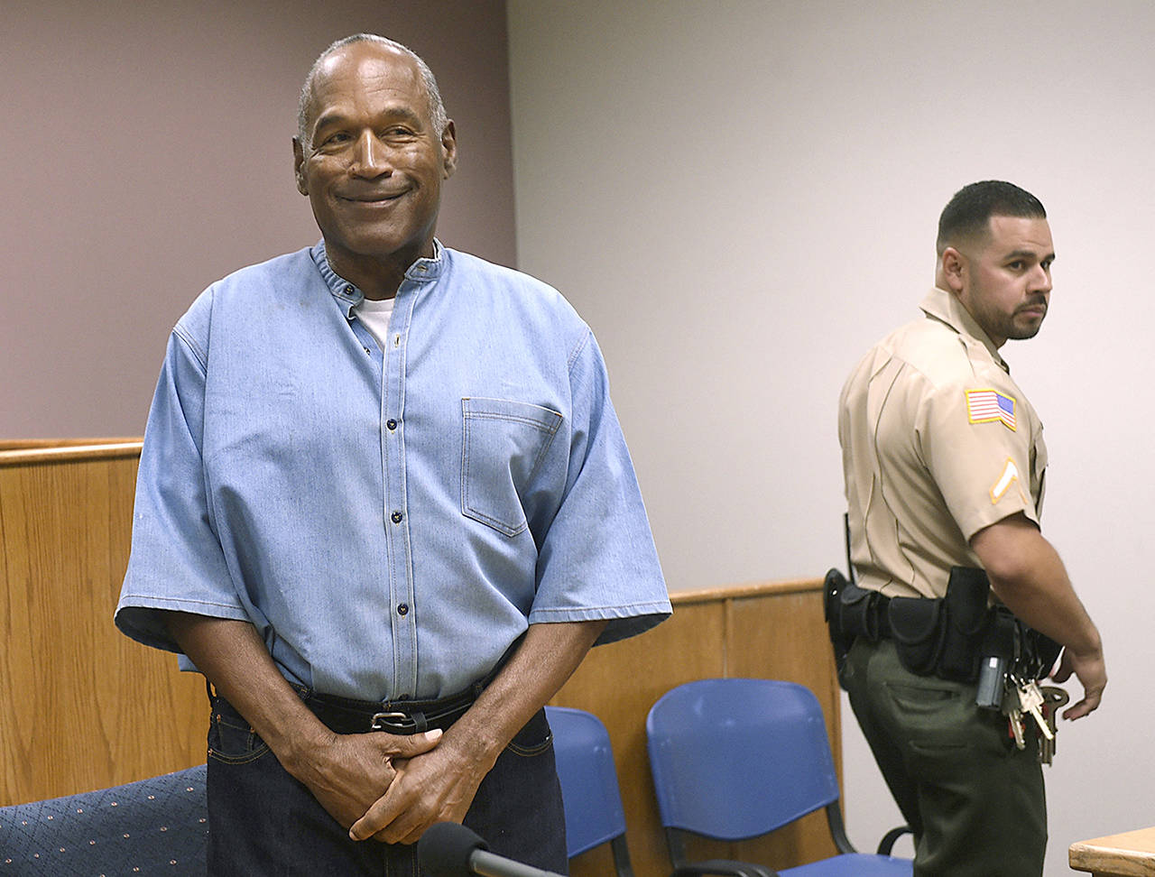 In this July 20 photo, former NFL football star O.J. Simpson enters for his parole hearing at the Lovelock Correctional Center in Lovelock, Nevada. (Jason Bean/The Reno Gazette-Journal via AP, Pool, File)