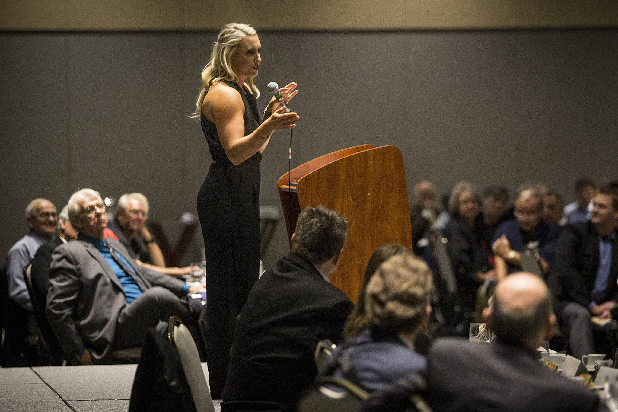 Keynote speaker Danielle Lawrie, a former University of Washington star and member of the 2008 Canadian Olympic softball team, speaks during the eighth annual Snohomish County Sports Hall of Fame Banquet at Xfinity Arena in Everett on Sept. 27, 2017. (Ian Terry / The Herald)