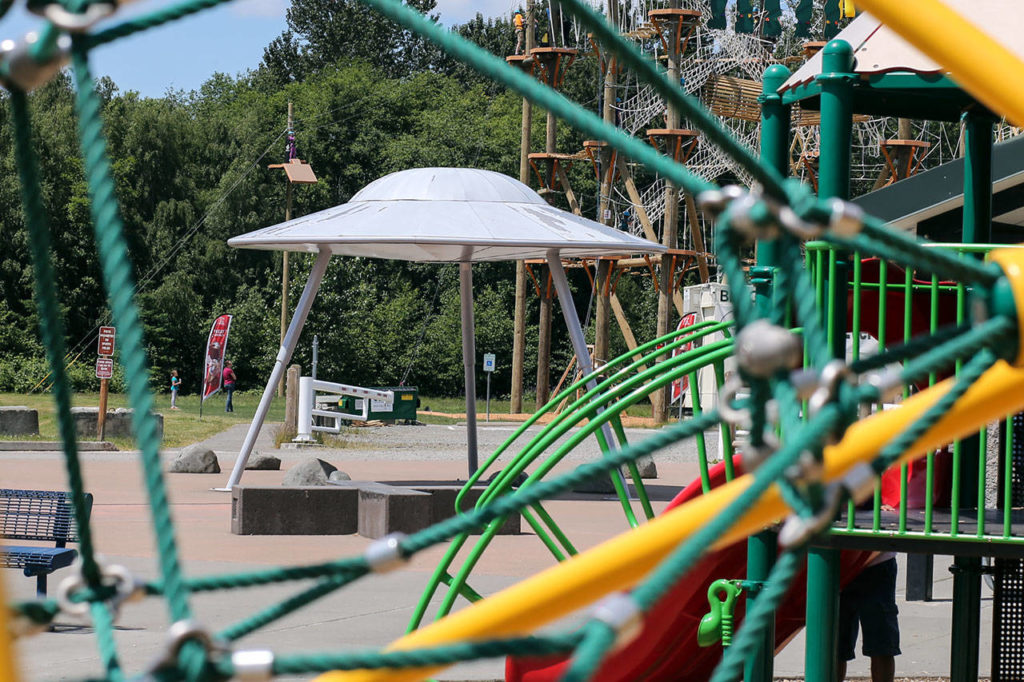 This giant UFO-style sculpture can be found at the Paine Field Community Park playground. (Kevin Clark / The Herald)
