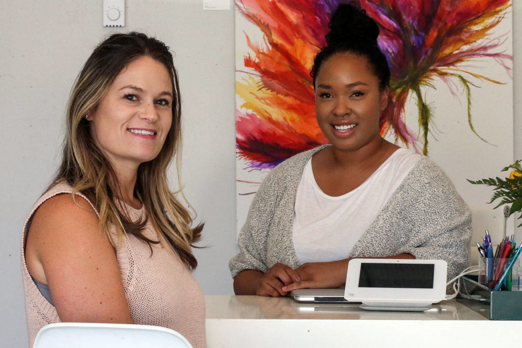 Brandi Pattison, left, and Athena Walker opened Waxology: A Beauty Boutique in May and offer whole-body waxing services, including Brazilian waxes for men and women. (Kevin Clark / The Herald)
