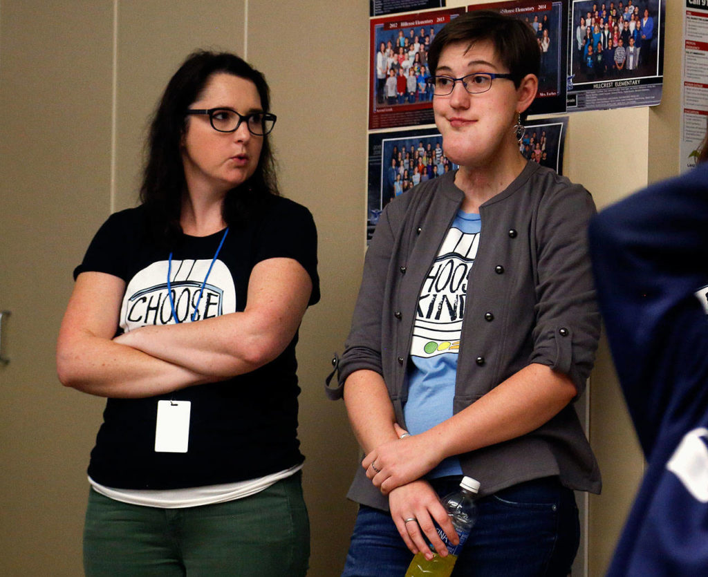 Abby Beauchamp talks with fifth-grade teacher Jessica Simonson before fielding questions from three classes of students at Hillcrest Elementary School. (Dan Bates / The Herald)
