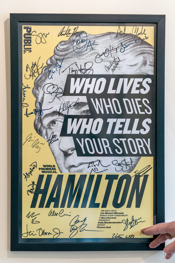 A poster from “Hamilton,” the musical, hangs in the foyer of Ron Chernow’s home. (Photo for The Washington Post by Michael Rubenstein)
