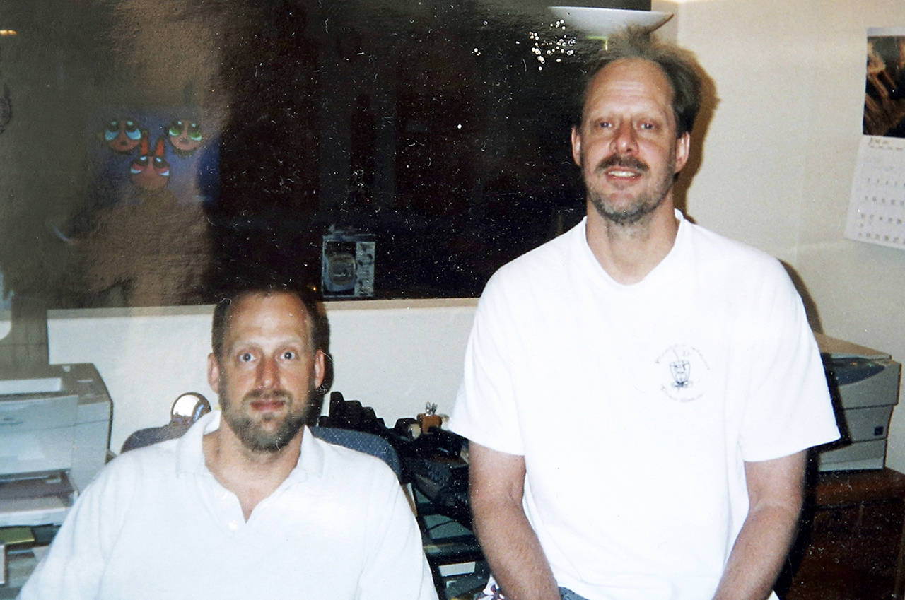 This undated photo shows Eric Paddock (left) with his brother, Las Vegas gunman Stephen Paddock, at right. Stephen Paddock opened fire on the Route 91 Harvest Festival on Sunday, killing dozens and wounding hundreds. (Courtesy of Eric Paddock via AP)