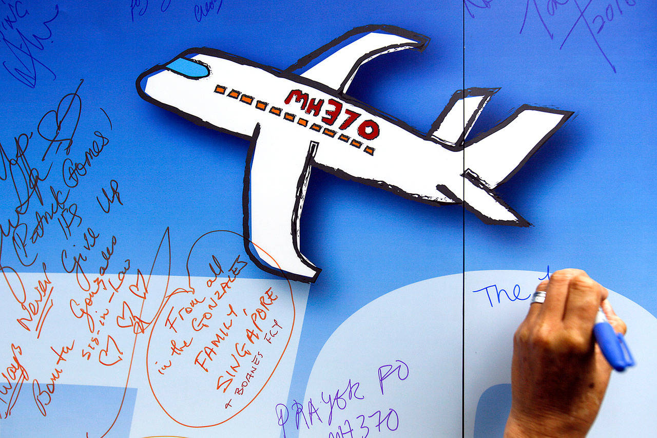 Sentiments wishes are written on a wall of hope in Kuala Lumpur, Malaysia, during a remembrance event in 2016 for passengers on ill-fated Malaysia Airlines Flight 370. A final report on the search for the missing Boeing 777 says the continuing mystery over the fate of the plane and the 239 people on board is “almost inconceivable.” But the Australian Transport Safety Bureau concedes that authorities are no closer to knowing the reasons for the plane’s disappearance in 2014. (AP Photo/Joshua Paul, File)