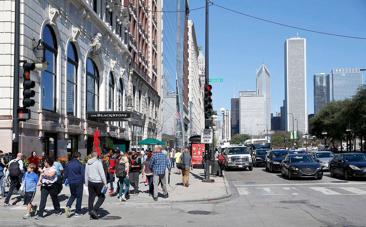 The Blackstone Hotel (left) on Michigan Avenue, across the street from Chicago’s Grant Park. (AP Photo/Charles Rex Arbogast)