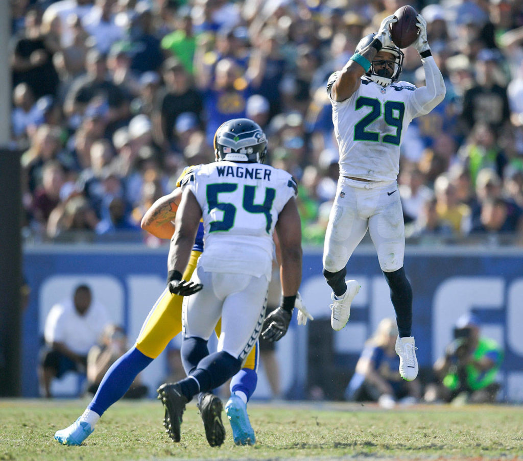 Mark J. Terrill / Associated Press
Seattle Seahawks free safety Earl Thomas (29) intercepts a pass late in the second half of Sunday’s NFL game in Los Angeles.
