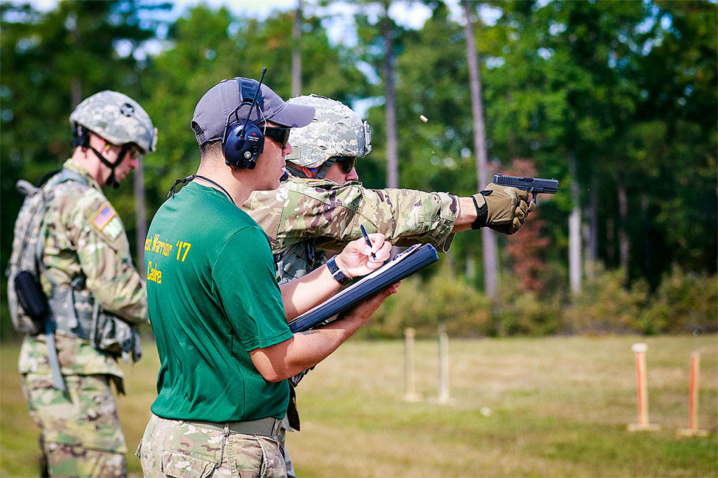 Sgt. Steven L. Galimore / U.S. Army 
Reimers fires a Glock-19 pistol for qualification during the 2017 Best Warrior Competition.
