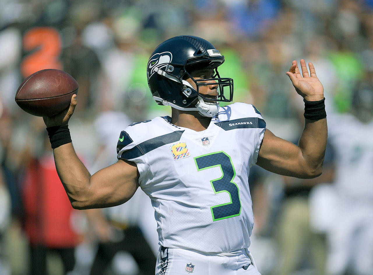 Seattle quarterback Russell Wilson, who has been hit a great deal this season as the Seahawks continue to patch together their offensive line, will get this week’s bye to rest and recuperate. (AP Photo/Mark J. Terrill)