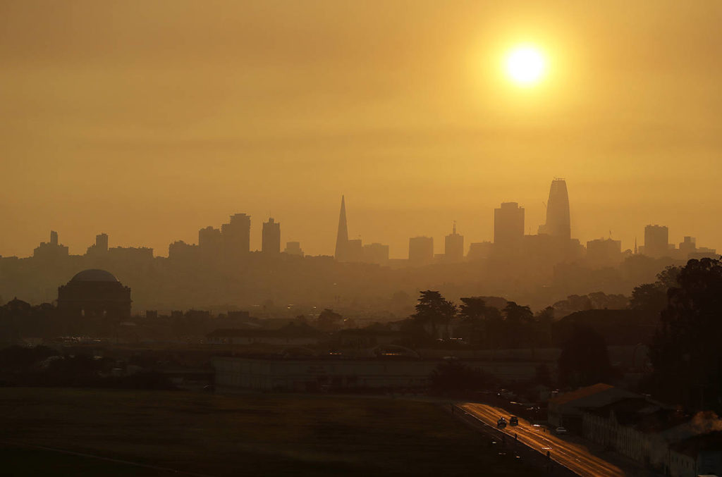 Smoke and haze from wildfires hovers over the skyline Thursday in San Francisco. (AP Photo/Eric Risberg)
