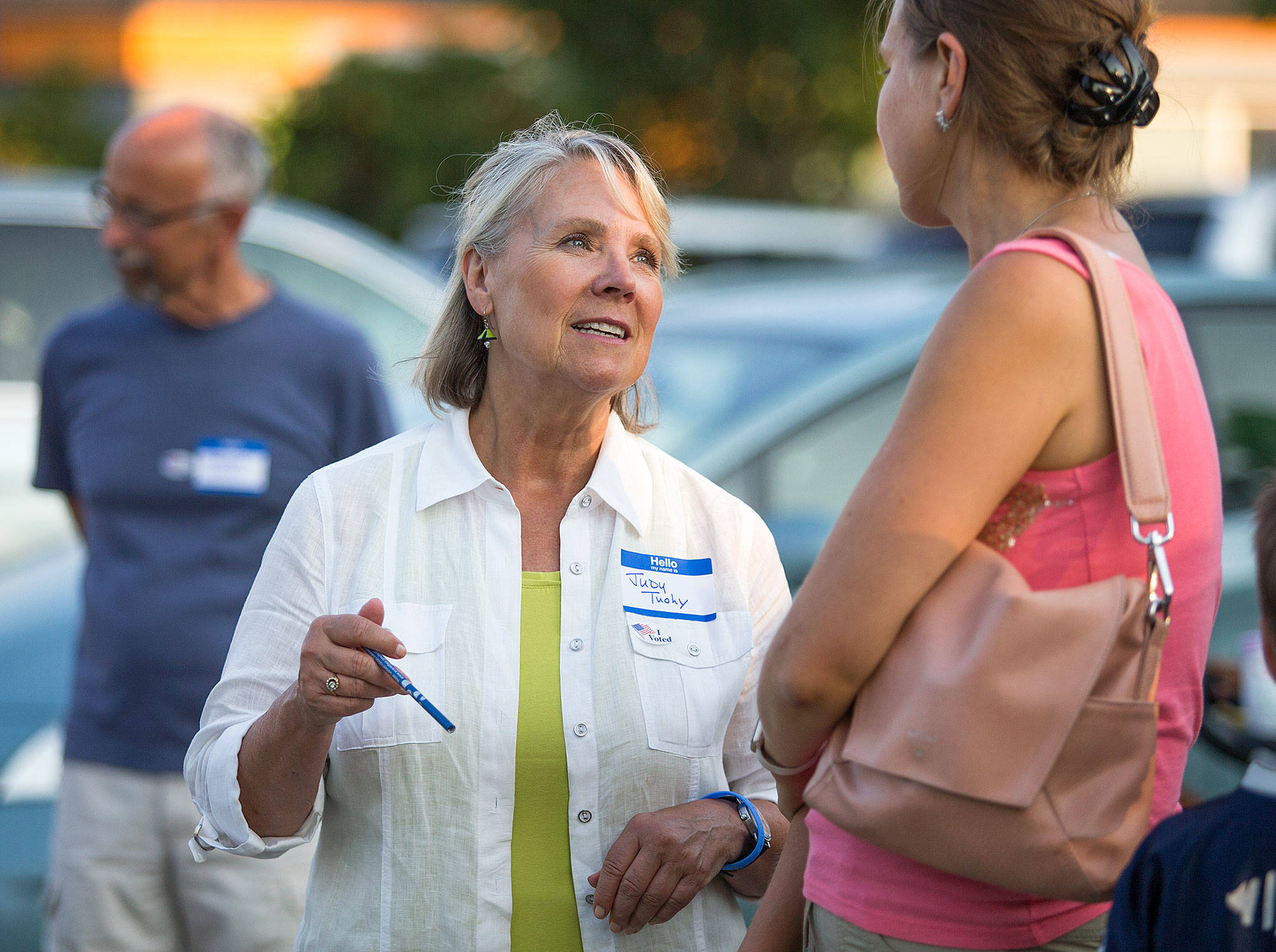 Mayoral candidate Judy Tuohy talks with potential voters at a National Night Out event Aug. 1. (Andy Bronson / The Herald)