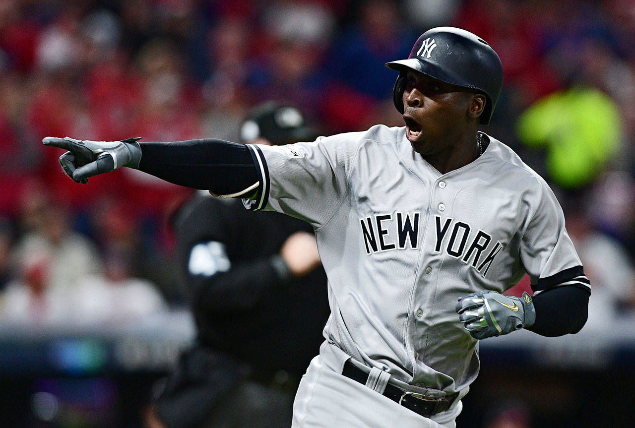 The Yankees’ Didi Gregorius points to the dugout after hitting a two-run home run off Indians starting pitcher Corey Kluber during the third inning of Game 5 of the American League Division Series on Oct. 11, 2017, in Cleveland. (AP Photo/David Dermer)