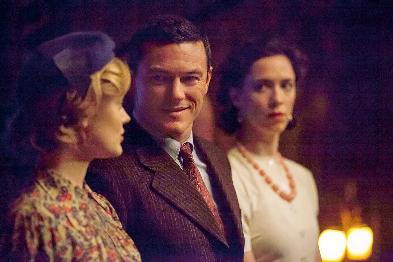 Annapurna Pictures                                From left, Bella Heathcote stars as Olive Byrne, Luke Evans as Dr. William Marston and Rebecca Hall as Elizabeth Marston in “Professor Marston and the Wonder Women.”                                Bella Heathcote stars as Olive Byrne (from left), Luke Evans as Dr. William Marston and Rebecca Hall as Elizabeth Marston in the film “Professor Marston and the Wonder Women.” (Annapurna Pictures)